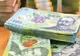 CCR bagă bani în plus în buzunarele primarilor! Legea de majorare a salariilor aleșilor locali, declarată constituțională
