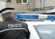 Un angajat al Poliției Locale Buzău prins că a trecut cu o sticlă de vin în rucsac fără să o treacă pe la casele de marcat